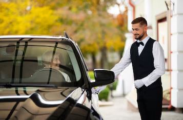 Valet parking attendant parking a car